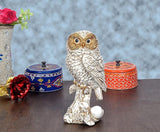 Standing owl decor figurine in cream and brown polyresin with wide blue eyes