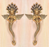 Pair of golden brass Naga Kanya door handles with crowned goddess faces and wings