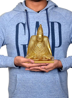 Brass Tulja Bhavani idol held in hands, seated goddess on small square base