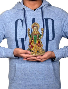 Multicolour brass Lakshmi figurine held in hands, height about 8 inches