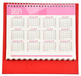 2027 table calendar with monthly date grids, spiral binding, pink header, red base