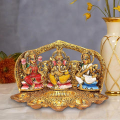 Hand-painted metal Ganesh, Saraswati and Lakshmi oil lamp diya, 5 inch height