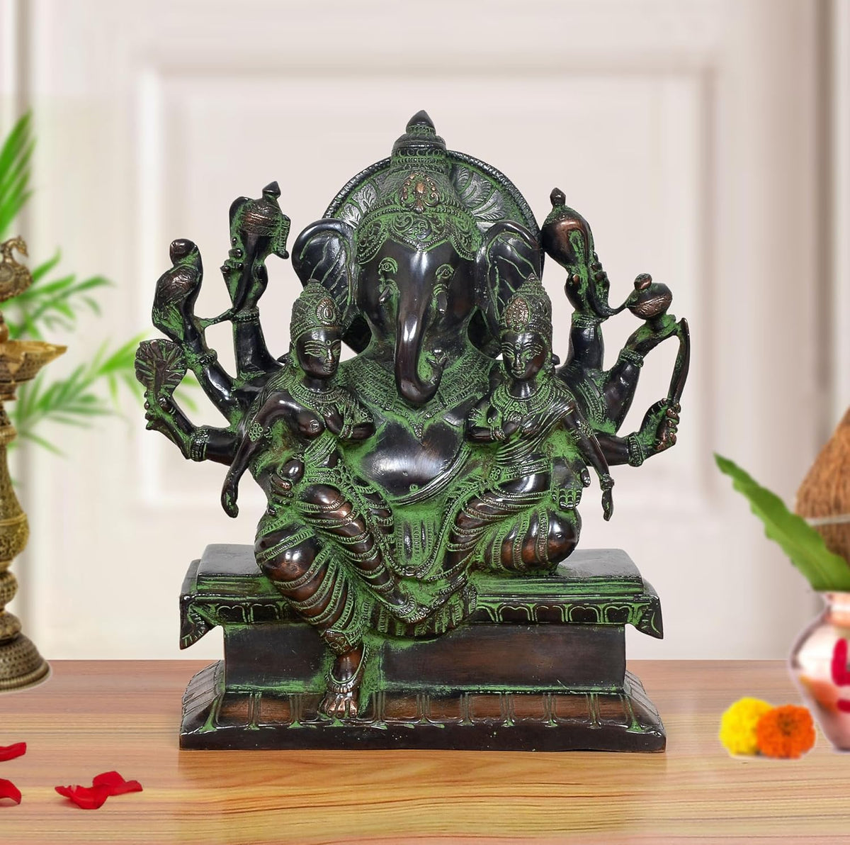 Brass Ganesha idol with Riddhi and Siddhi, detailed multi-figure, 10 inch height