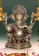 Brass Ganesha statue idol, seated with four arms and ornate crown, home mandir decor