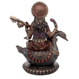 Large Saraswati idol back view, bronze-toned with multicolour purple drape