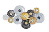 Abstract iron wall decor, circular metal discs in silver, gold, and black patterns