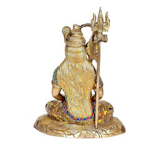 Brass Shiva statue rear/side view with trident staff, ornate robe, lotus base