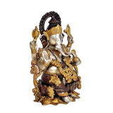 Ganesha brass idol, side view, seated, golden ornaments and detailed halo