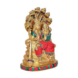 Brass Vishnu and Maa Lakshmi sitting on Sheshnag, angled view, red and green detailing