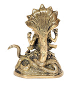 Rear view brass Vishnu statue on serpentine Sheshanaga, fan-like crown details