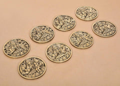 Set of 8 brass Ashtalakshmi wall hangings, oval relief plaques arranged in a cluster