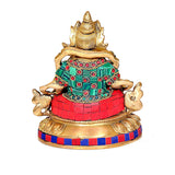 Back view of Brass Lord Kuber idol, ornate crown with teal and red beaded details