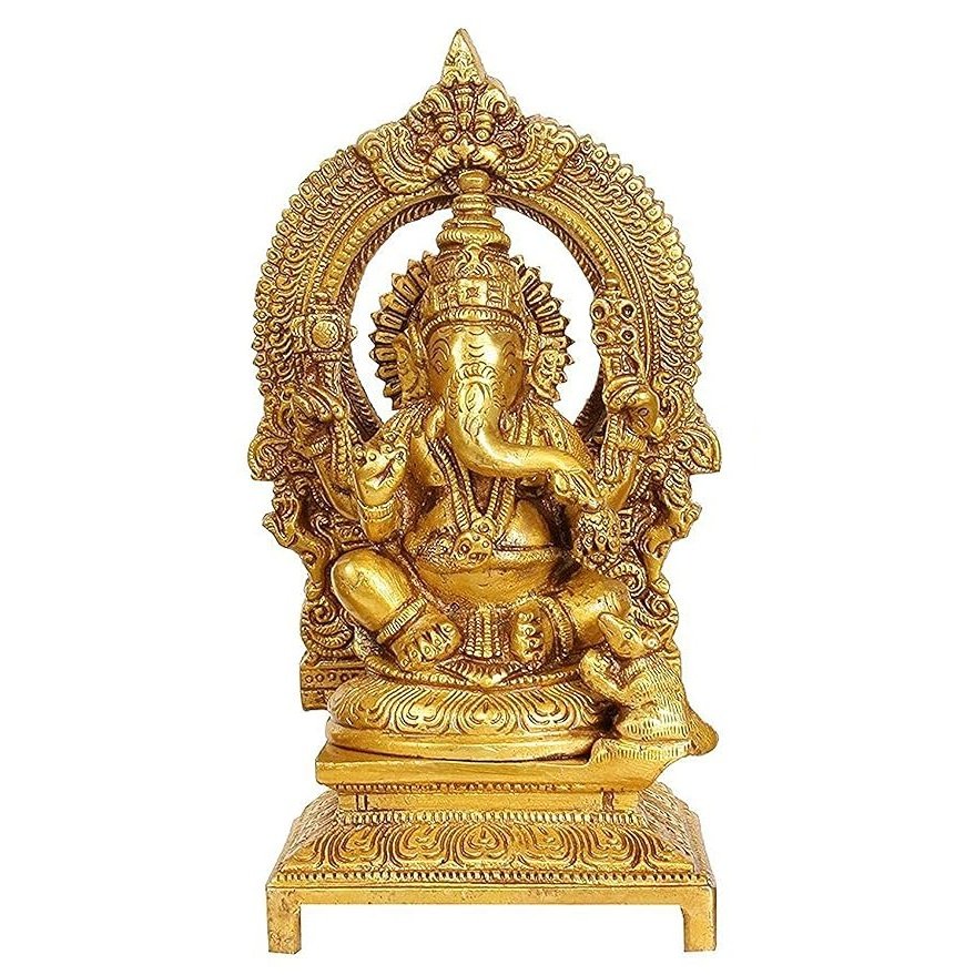 Gold brass Ganesha idol with ornate kirtimukha carved frame, 7 in height