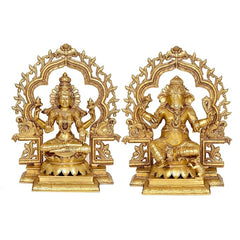 AONA brass pair: Lakshmi seated with raised arms, Ganesha seated in frame