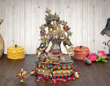 Large Tara Devi statue in gold brass with jeweled multicolor dress, seated on lotus