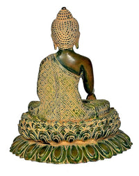 Back view of brass Buddha statue, seated on green lotus base with gold robe pattern