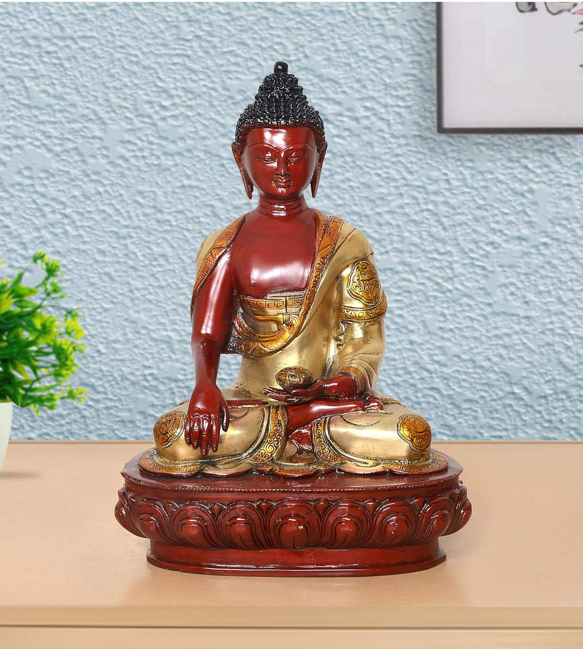 18-inch Buddha statue with red face, gold robe, seated hands in meditation on round base