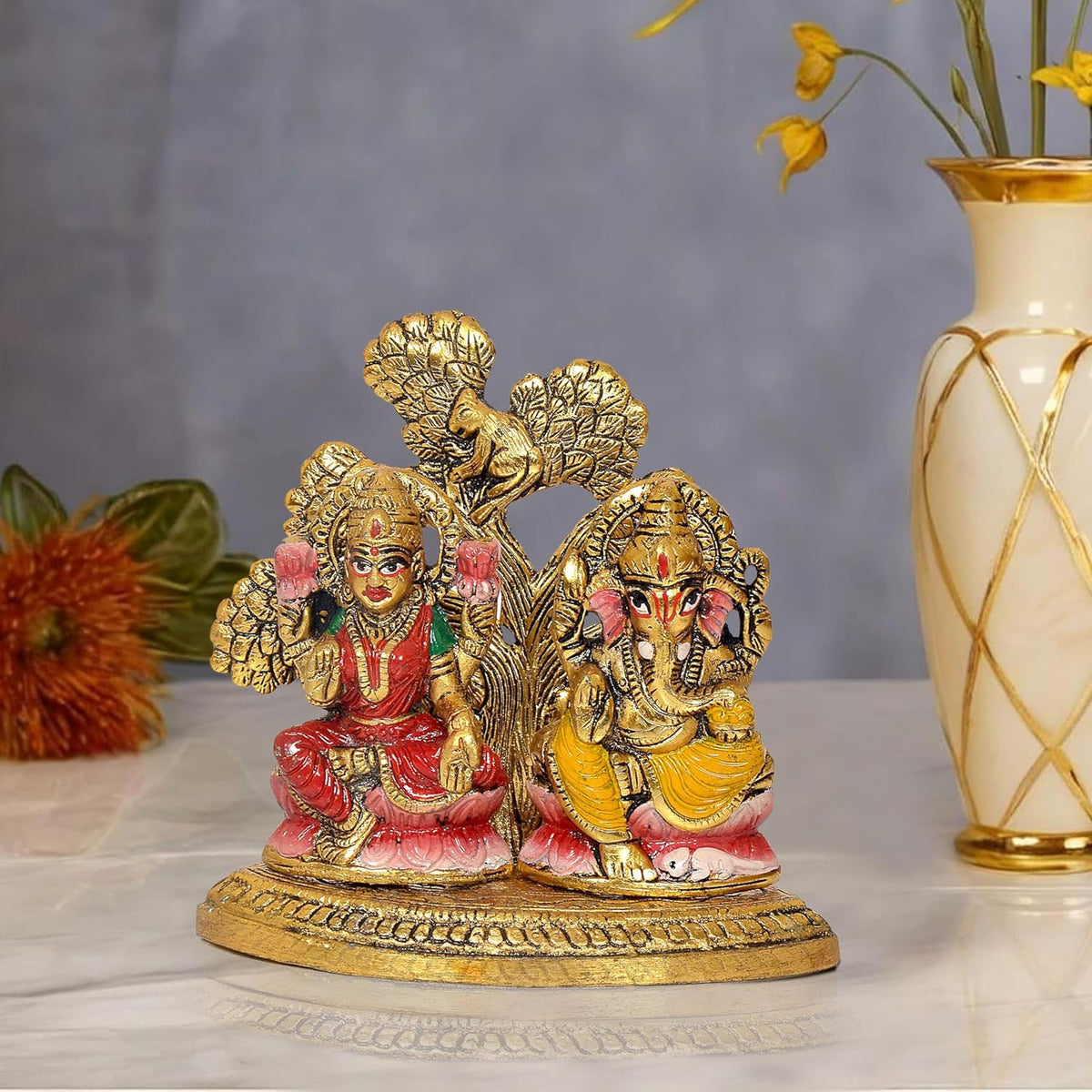 5-inch metal Lakshmi-Ganesha idol, seated figures on gold base