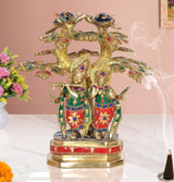 Brass Radha Krishna flute idol with colorful tree canopy, detailed figurine