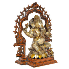 Brass Lord Ganesha idol, seated with raised hands and detailed sculpted base