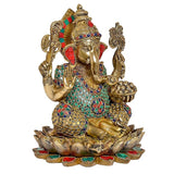 Ganesha brass statue side view on lotus, jeweled patterned torso and detailed hands