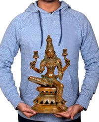 Person holding 12 inch Lakshmi statue, brass-tone seated yoga pose with four lamp holders