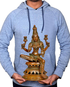 Person holding 12 inch Lakshmi statue, brass-tone seated yoga pose with four lamp holders