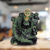 Brass laughing Buddha statue, green and black detailing, seated with hands in lap