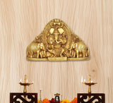 Brass Gaja Ganesha idol with elephants, front view on pedestal