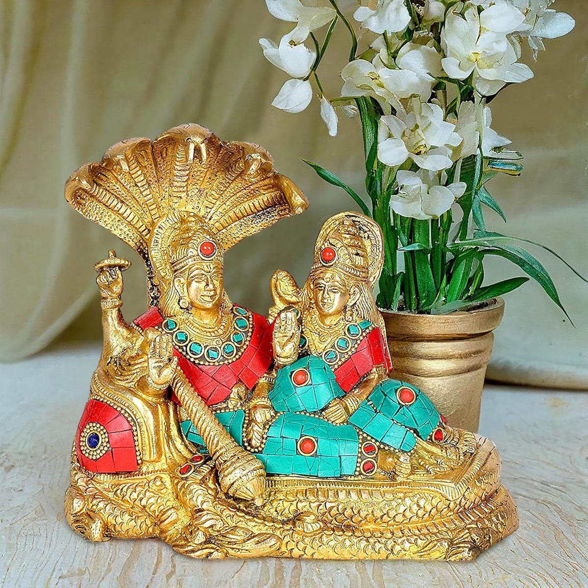 Brass Vishnu and Lakshmi idol on Shesha Naga, seated on serpent, multicolored