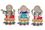 Back view of Lakshmi Ganesha Saraswati statue trio, silver finish, detailed halo tops