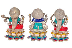 Back view of Lakshmi Ganesha Saraswati statue trio, silver finish, detailed halo tops