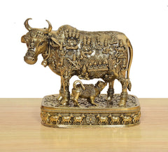 Kamdhenu cow with calf deity murti, detailed carvings on round pedestal base