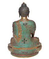 Back view of brass meditating Buddha statue with jeweled turquoise robe and ornate rounded base