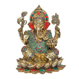 AONA Brass Ganesha idol on lotus, front view with ornate crown and detailed earrings