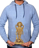 Brass Vishnu statue held in hands on grey hoodie