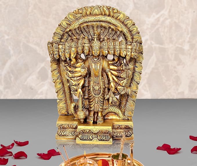 Golden brass Vishnu Dasavatara idol with ornate arch behind, seated central figure