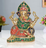 Seated Lord Ganesha idol in brass, jeweled green-red robe, four arms raised