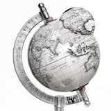 Political world globe showing Americas and Indian Ocean with magnifying lens attachment