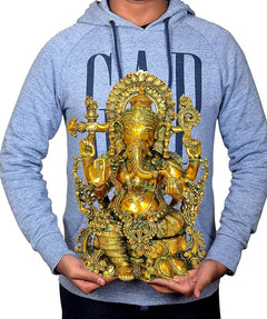 AONA Ganesha idol print on light blue hoodie, model holding the shirt
