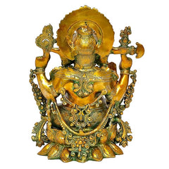Brass Ganesha idol front view, crown halo and richly detailed torso ornaments