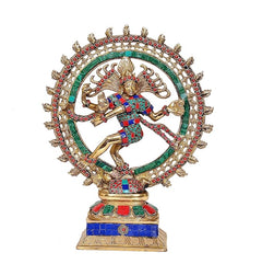 Brass Natraja dancer idol with green circular frame and red jeweled trim, on blue base