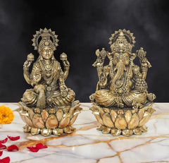 Brass Lakshmi and Ganesh statue set, seated on lotus bases with detailed crowns