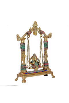 Brass Ganesha jhula front-left view, ornate deity figure with multicolor pillar supports