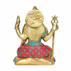 Rückansicht Shiva-Statue mit Trishul, rundes Medaillon am Rücken, farbige Gürtelplatte