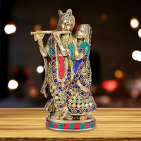 Brass Radha Krishna idol with stone work (8.5 in): Krishna flute, Radha holds close.