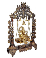 Ganesha swing figurine centered, hanging chains with bells, carved brown uprights