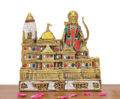 Ram Mandir metal model, ornate temple towers and colorful deity in front