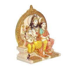 Shiva family statue angled view, Ganesh beside seated Shiva and Parvati in colorful robes