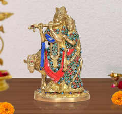 Radha-Krishna brass cow idol statue, blue-red attire with turquoise jewel work